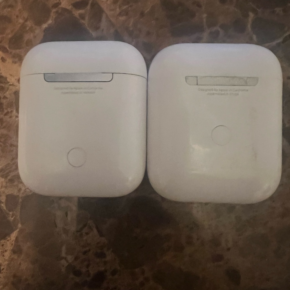 AirPod charging cases (white)
